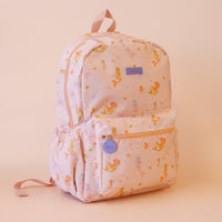 Fox & Fallow Backpack with mermaid pattern on a beige background
