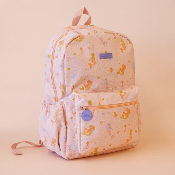 Fox & Fallow Backpack with mermaid pattern on a beige background