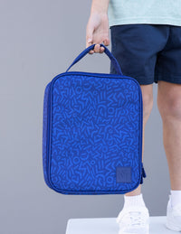 Montii Co Large Insulated Lunch bag for keeping food cool being held by a child.  The Montii Insulated Lunchbags include the MontiiCo's best-selling ice pack.