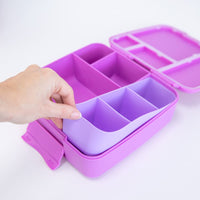 Fuchsia Montii Feast Tray inside the Montii Feast Lunchbox on a white background