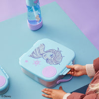Child's Frozen BBox lunch box with  on a blue surface, next to a Frozen BBox water bottle.